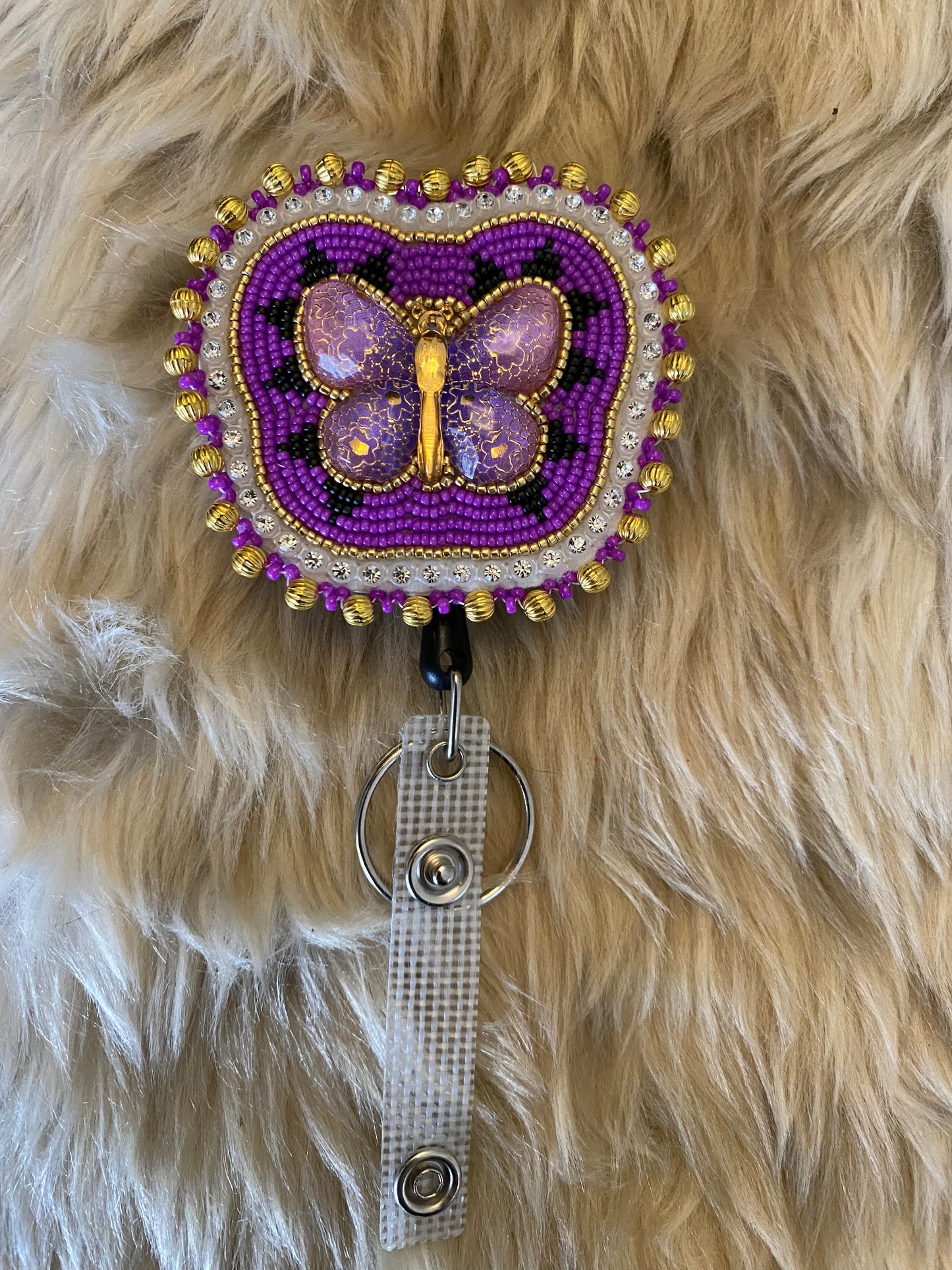 Purple butterfly badge reel